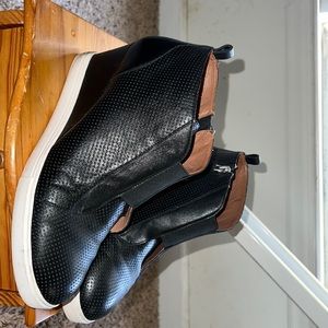 Black wedge boot great for dressing up for dinner and casual: